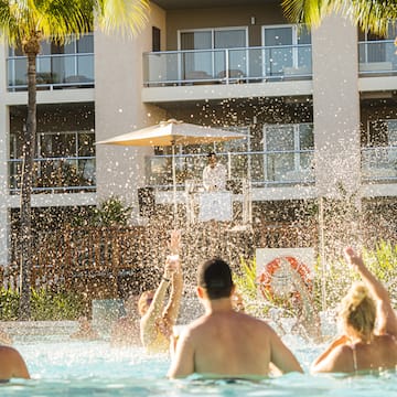 a group of people in a pool