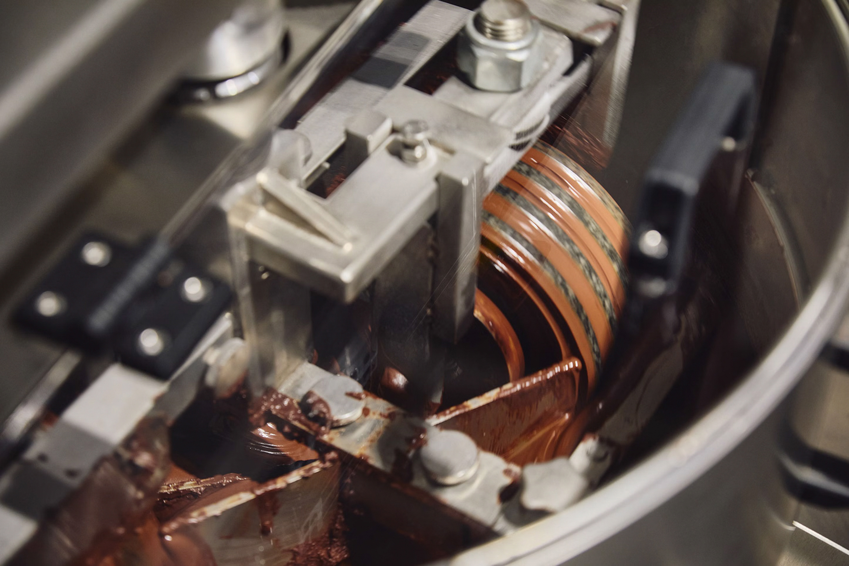 a machine with a chocolate coating