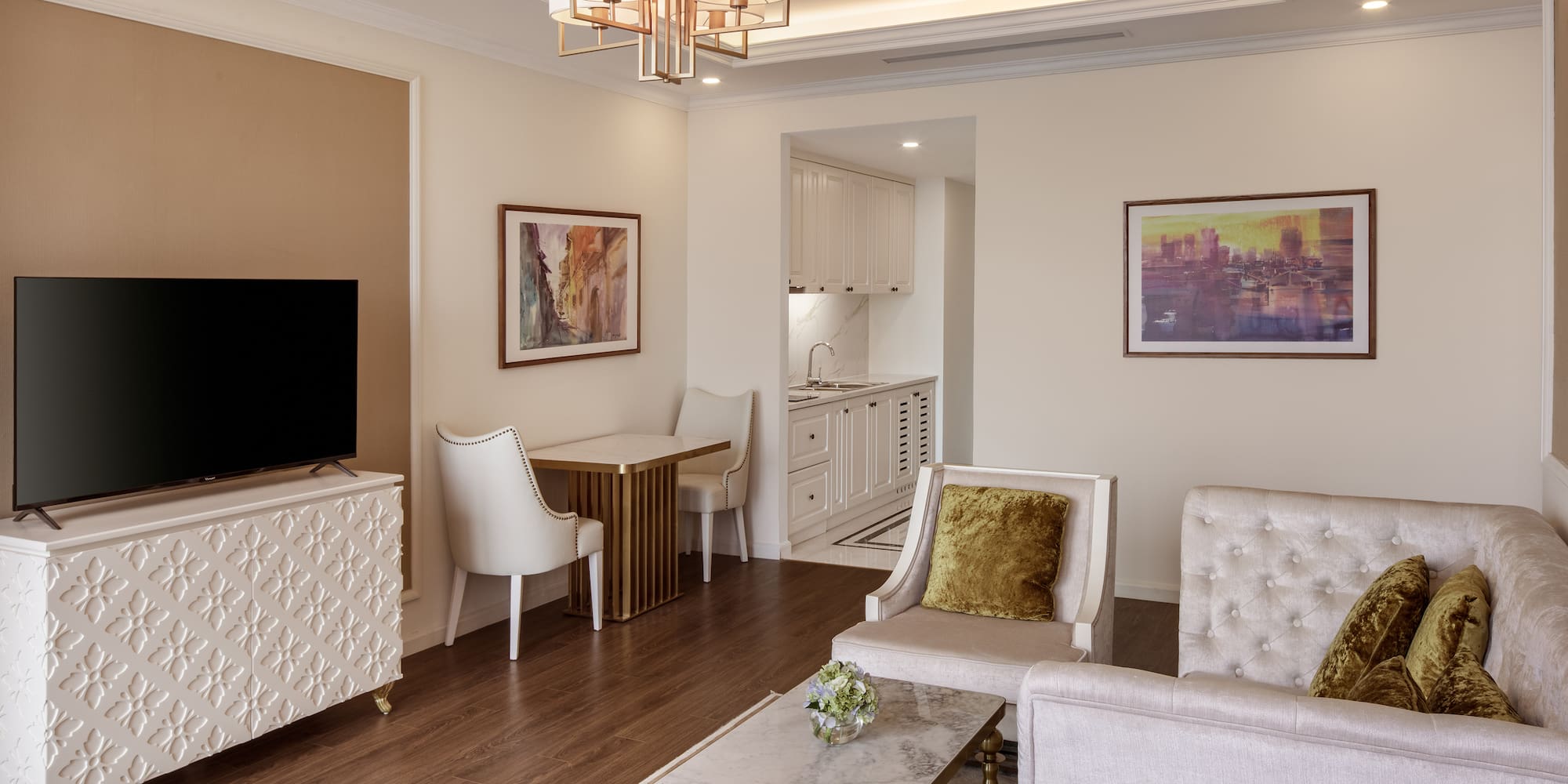 a living room with a tv and furniture