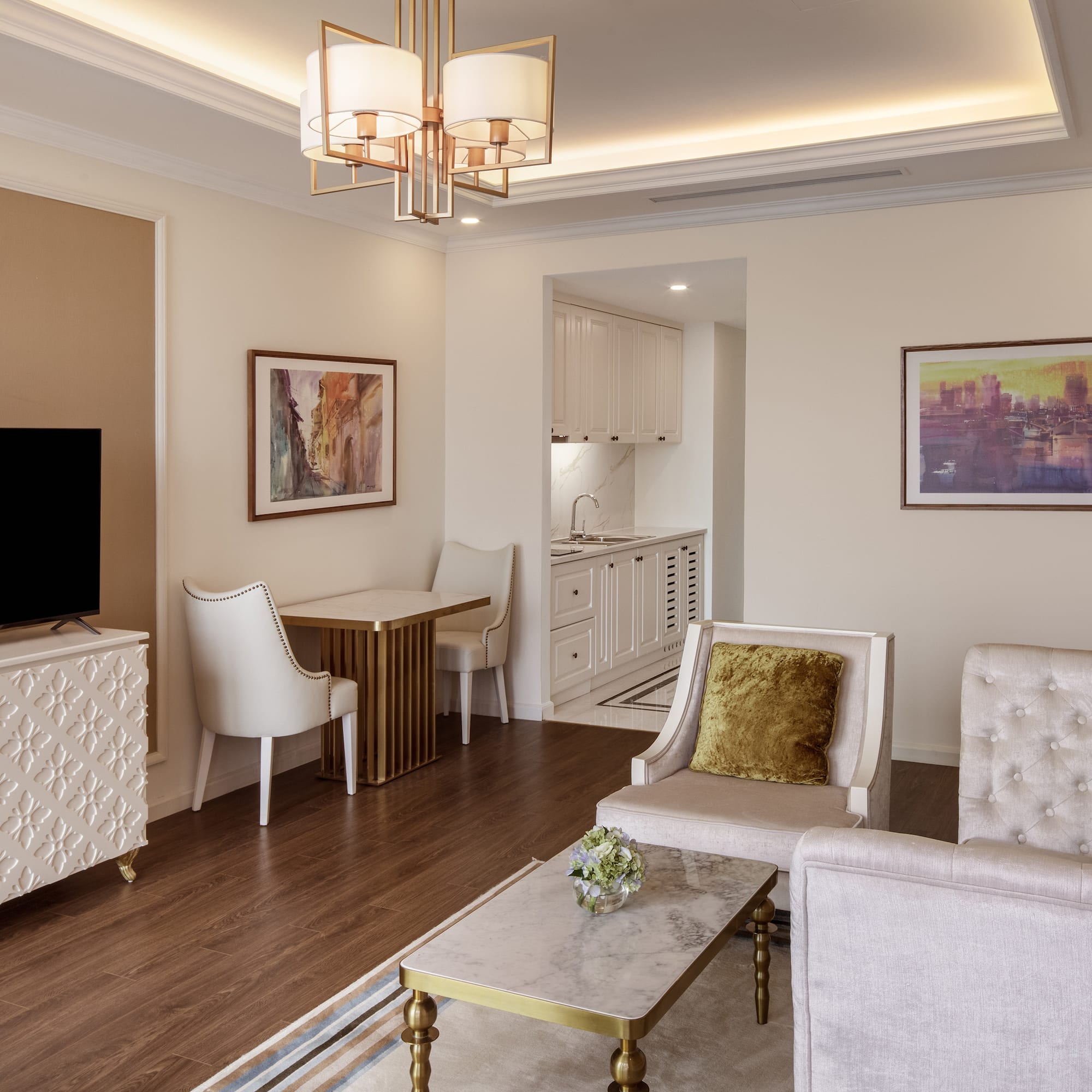 a living room with a tv and furniture