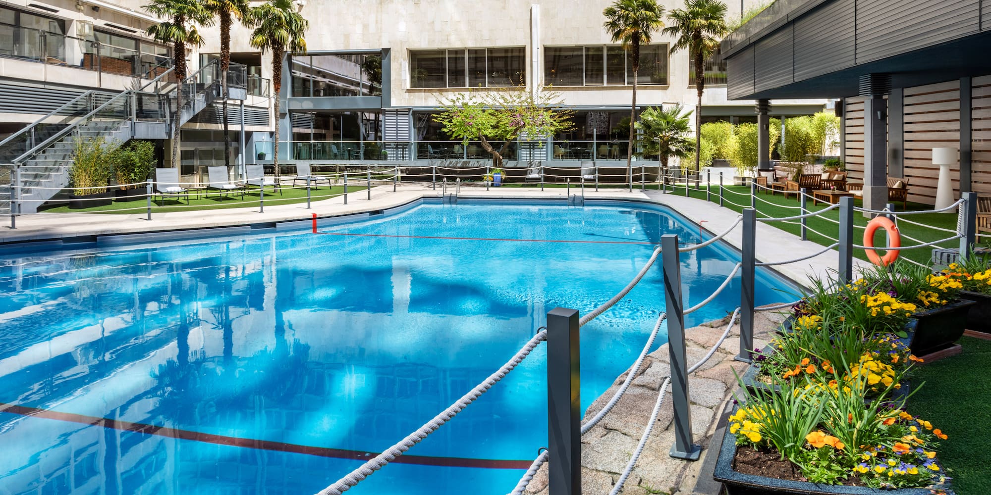 a swimming pool with rope around it