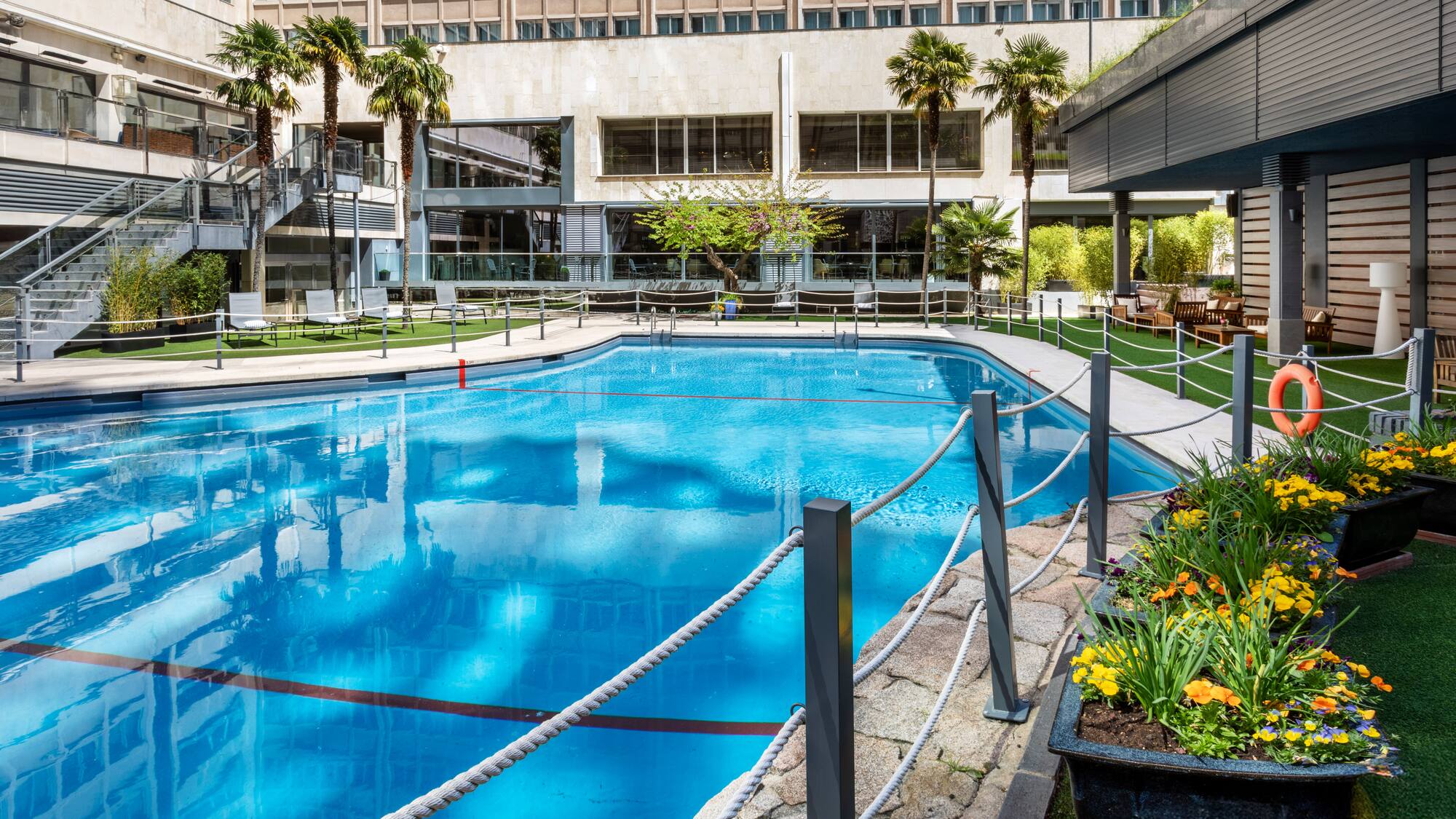 a swimming pool with rope around it