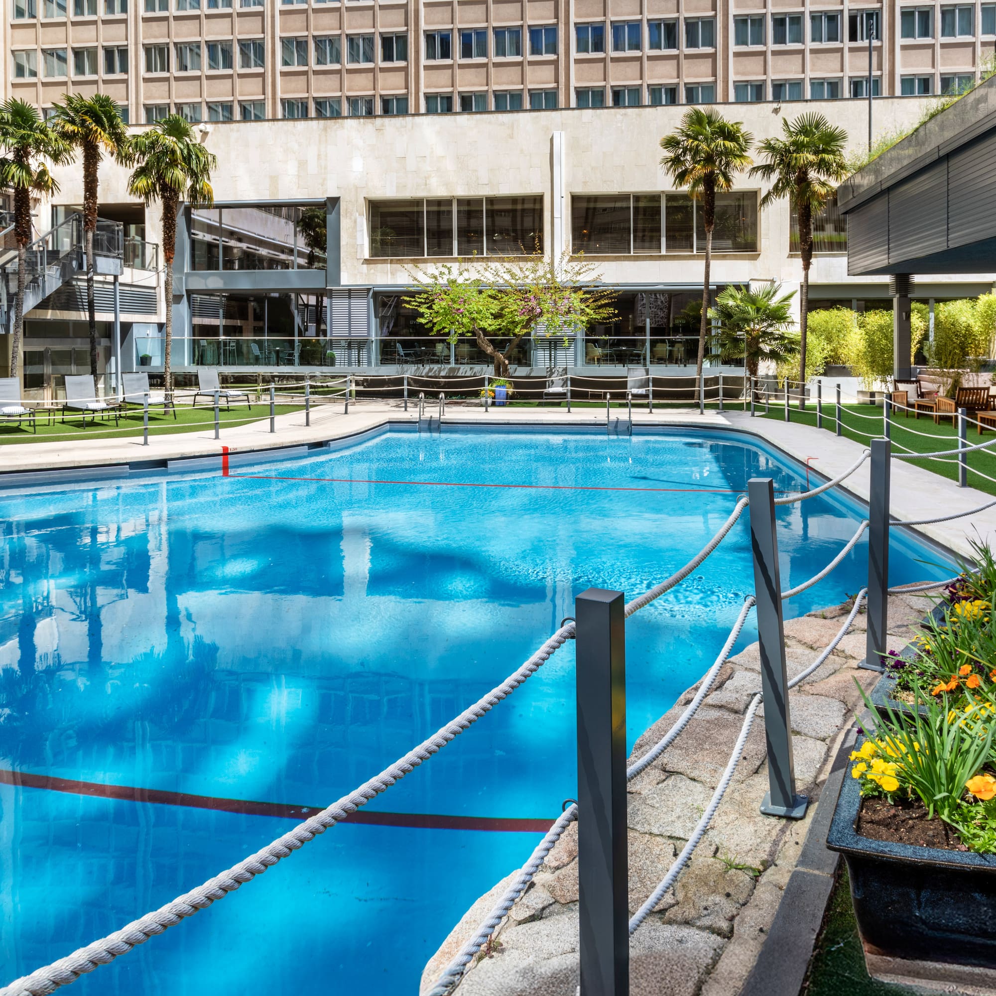 a swimming pool with rope around it
