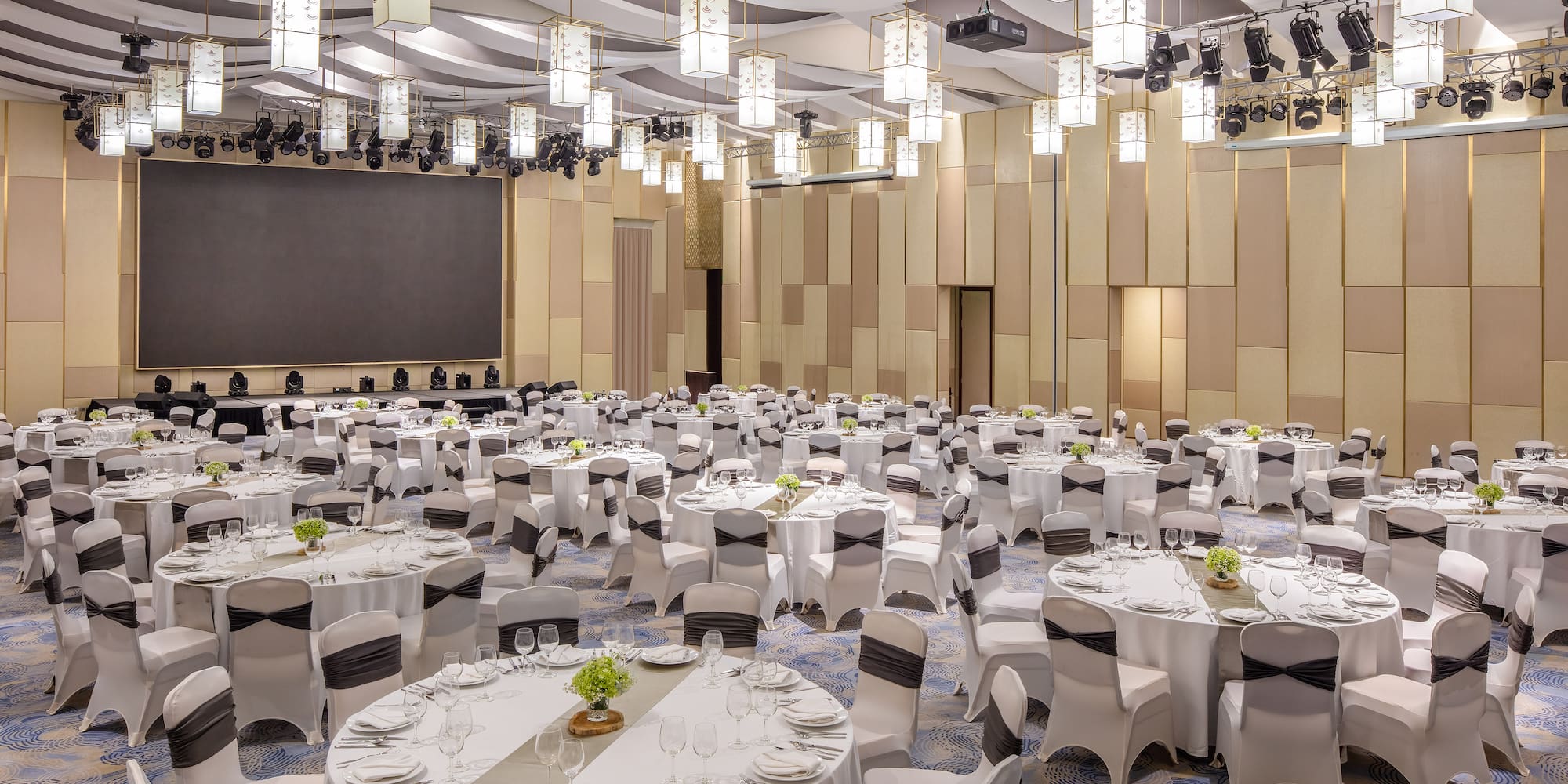 a large room with tables and chairs