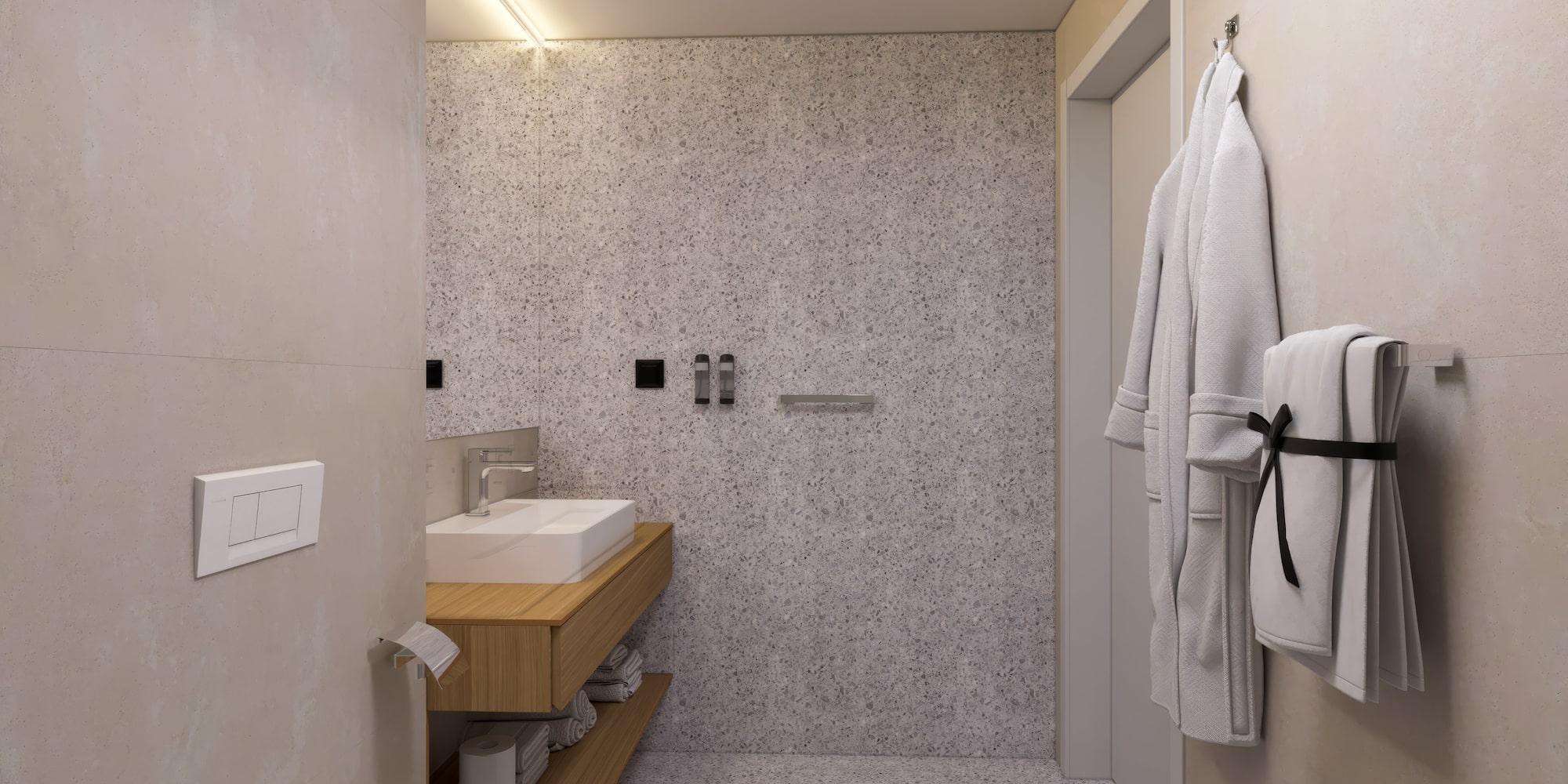 a bathroom with a sink and a towel on the wall