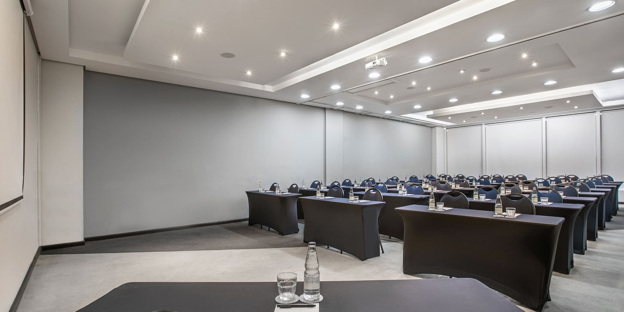 a room with tables and chairs