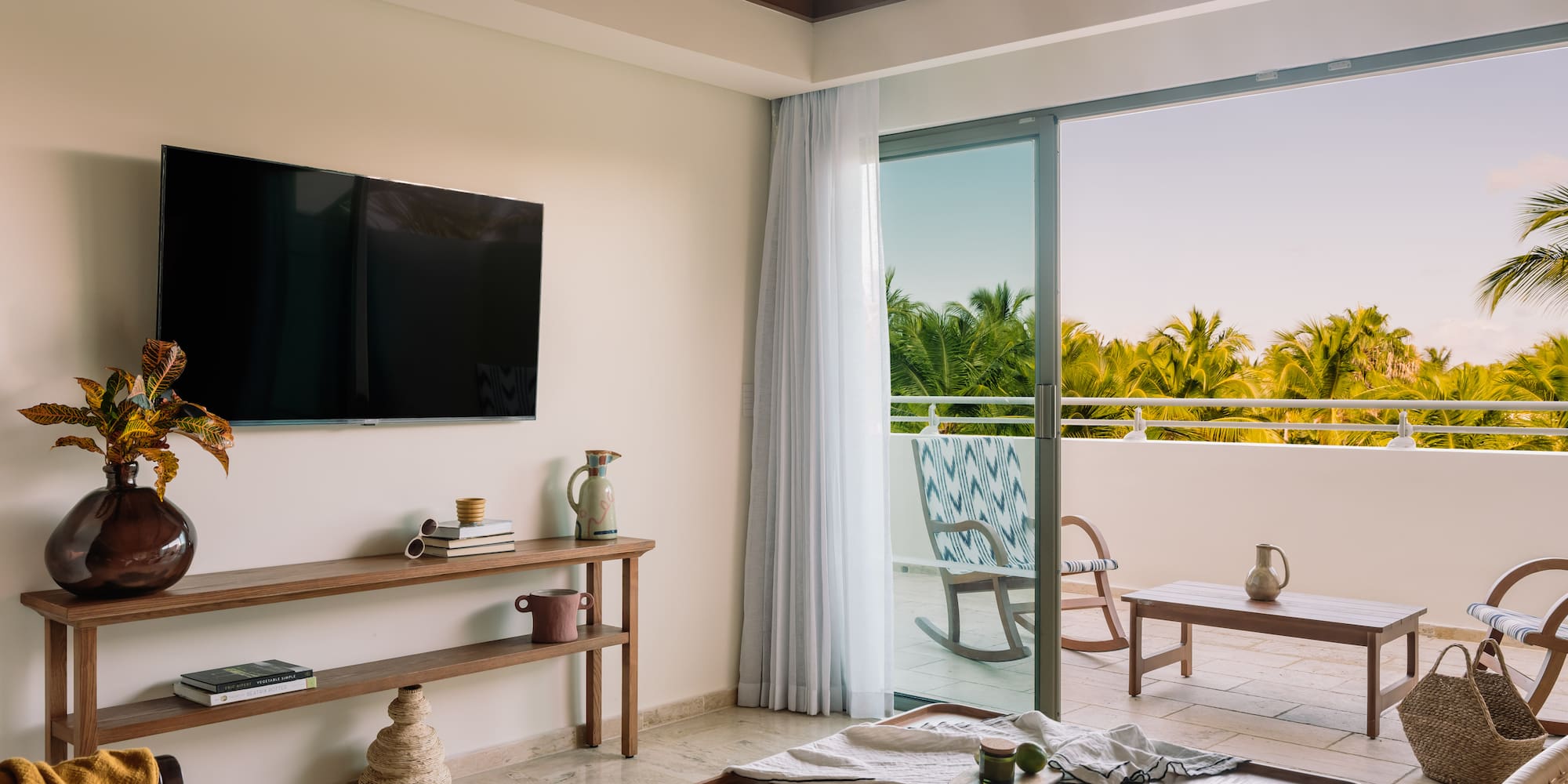 a room with a television and a table