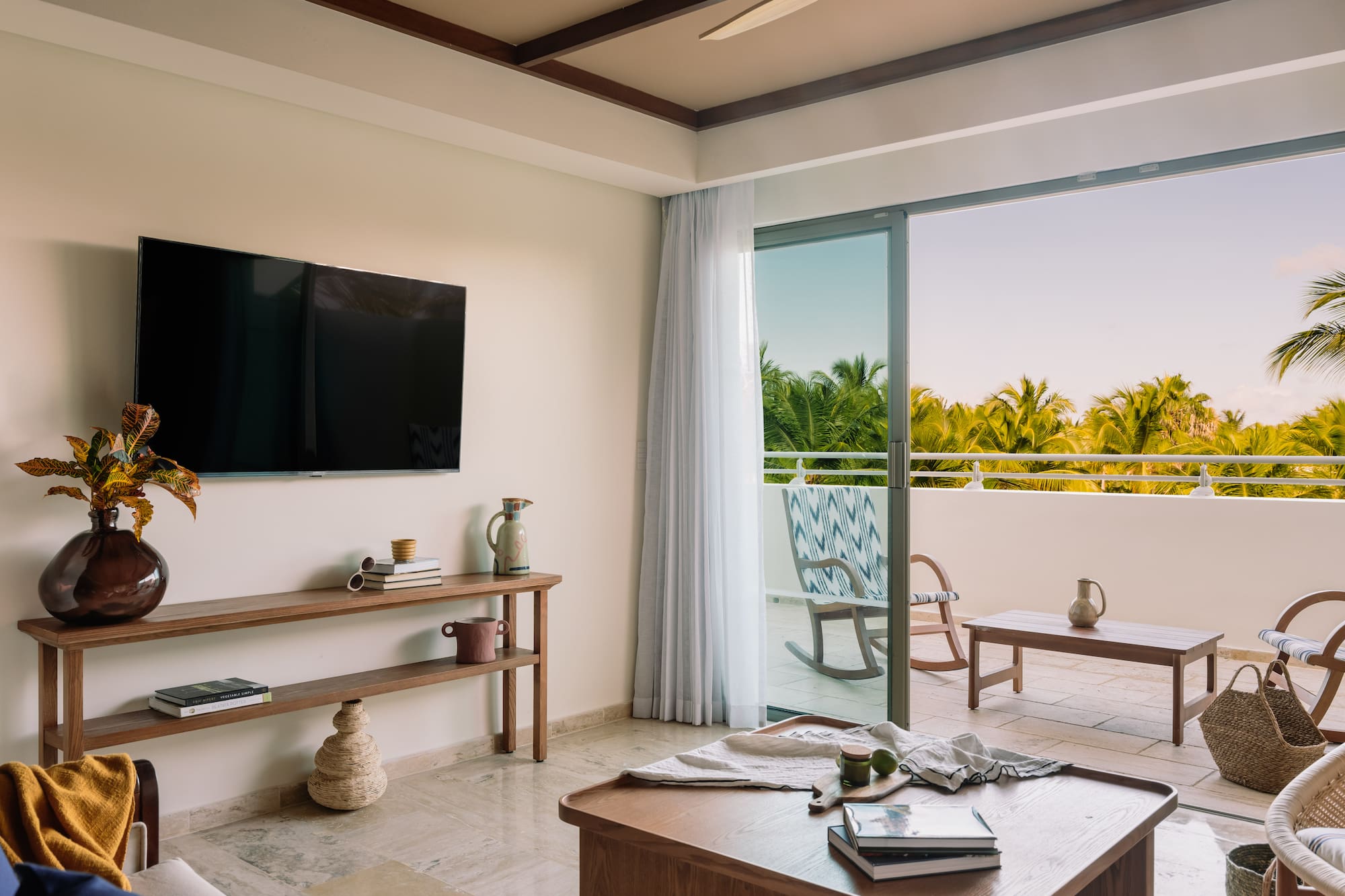 a room with a television and a table