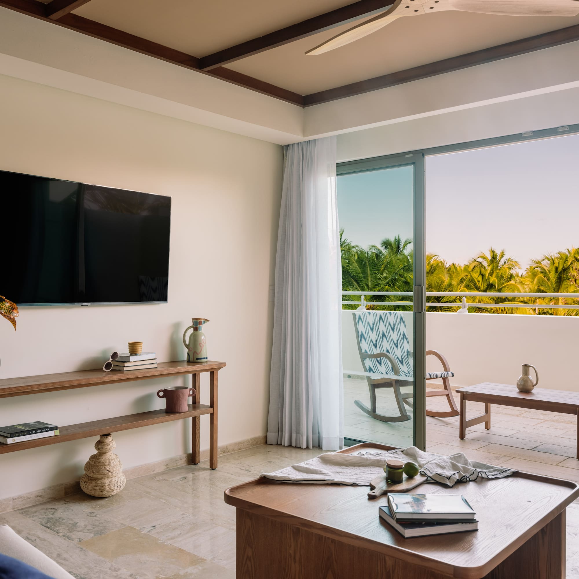 a room with a television and a table