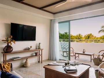 a room with a television and a table