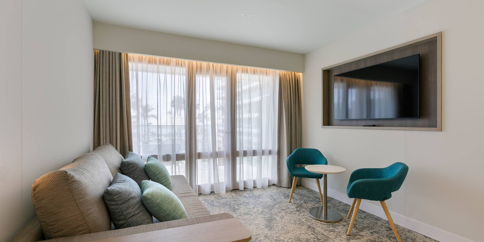 a room with a couch and a tv