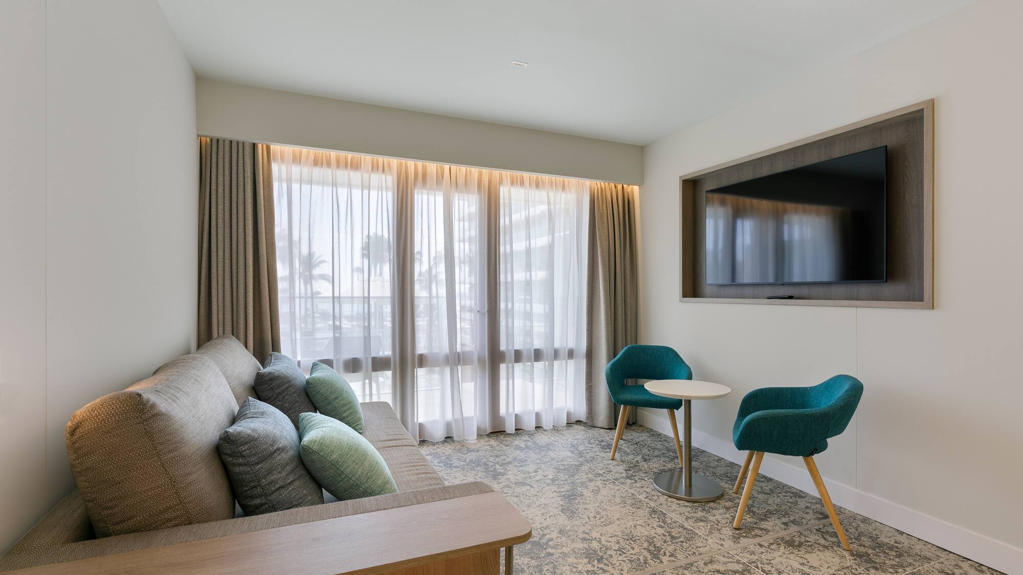 a room with a couch and a tv