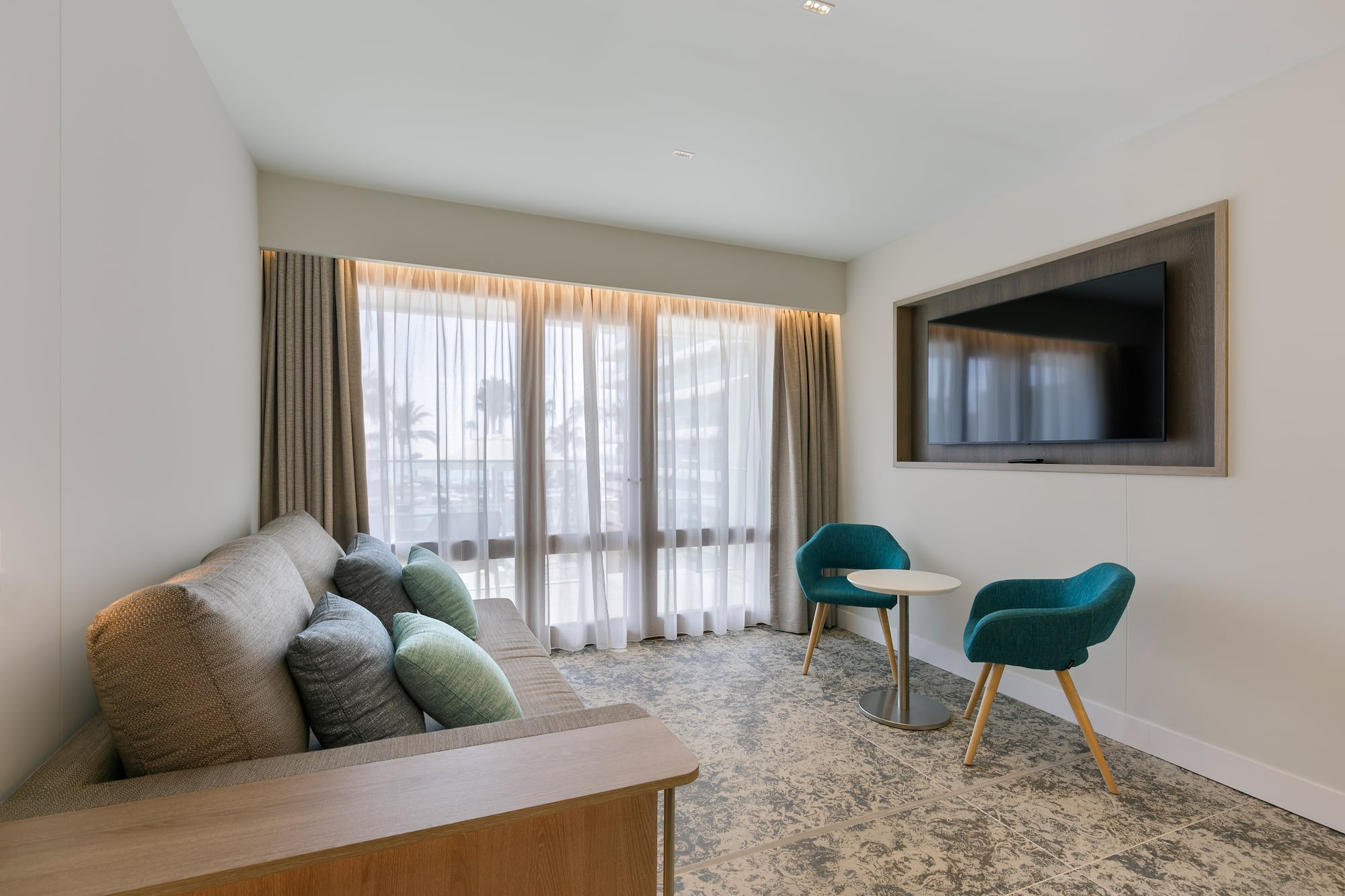 a room with a couch and a tv