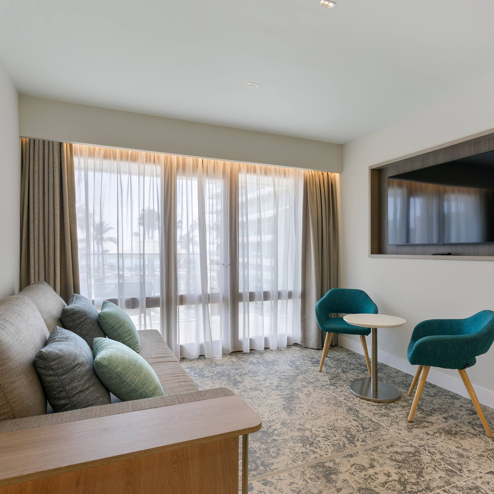 a room with a couch and a tv