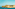 Historic fortifications and red lighthouse guarding Grand Harbour, Valletta.