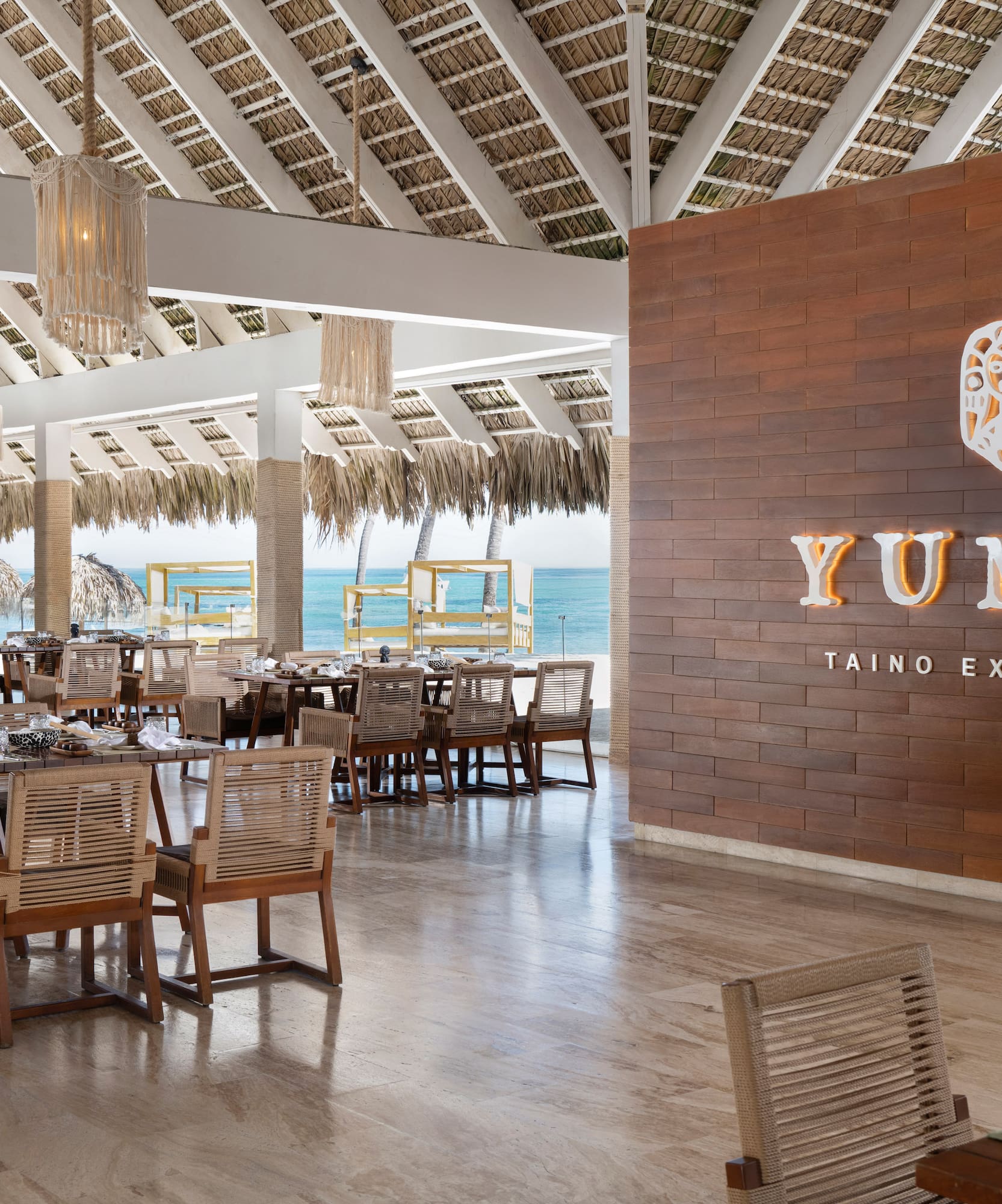 a restaurant with tables and chairs