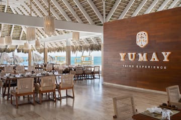 a restaurant with tables and chairs