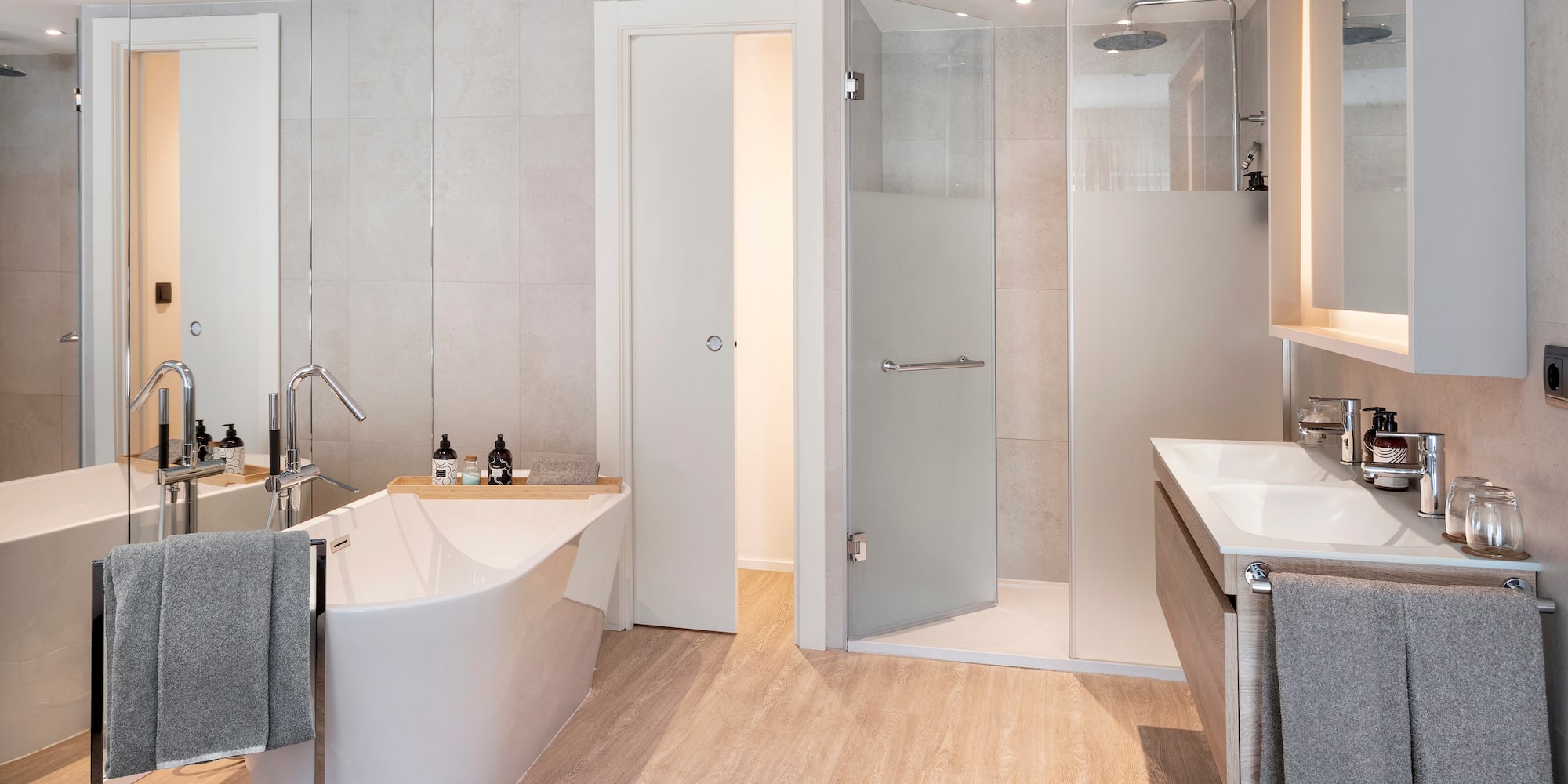 a bathroom with a tub and shower