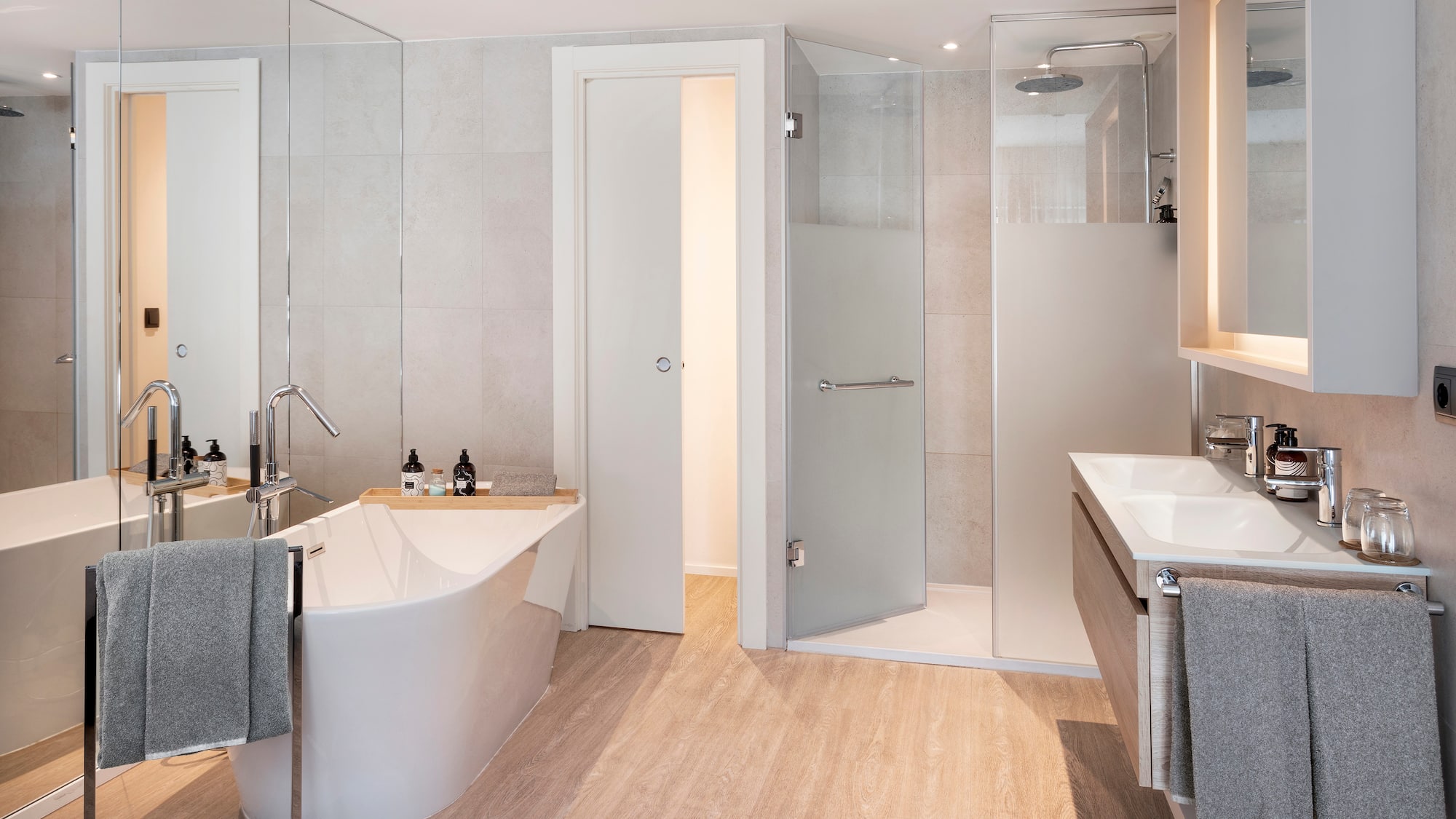 a bathroom with a tub and shower