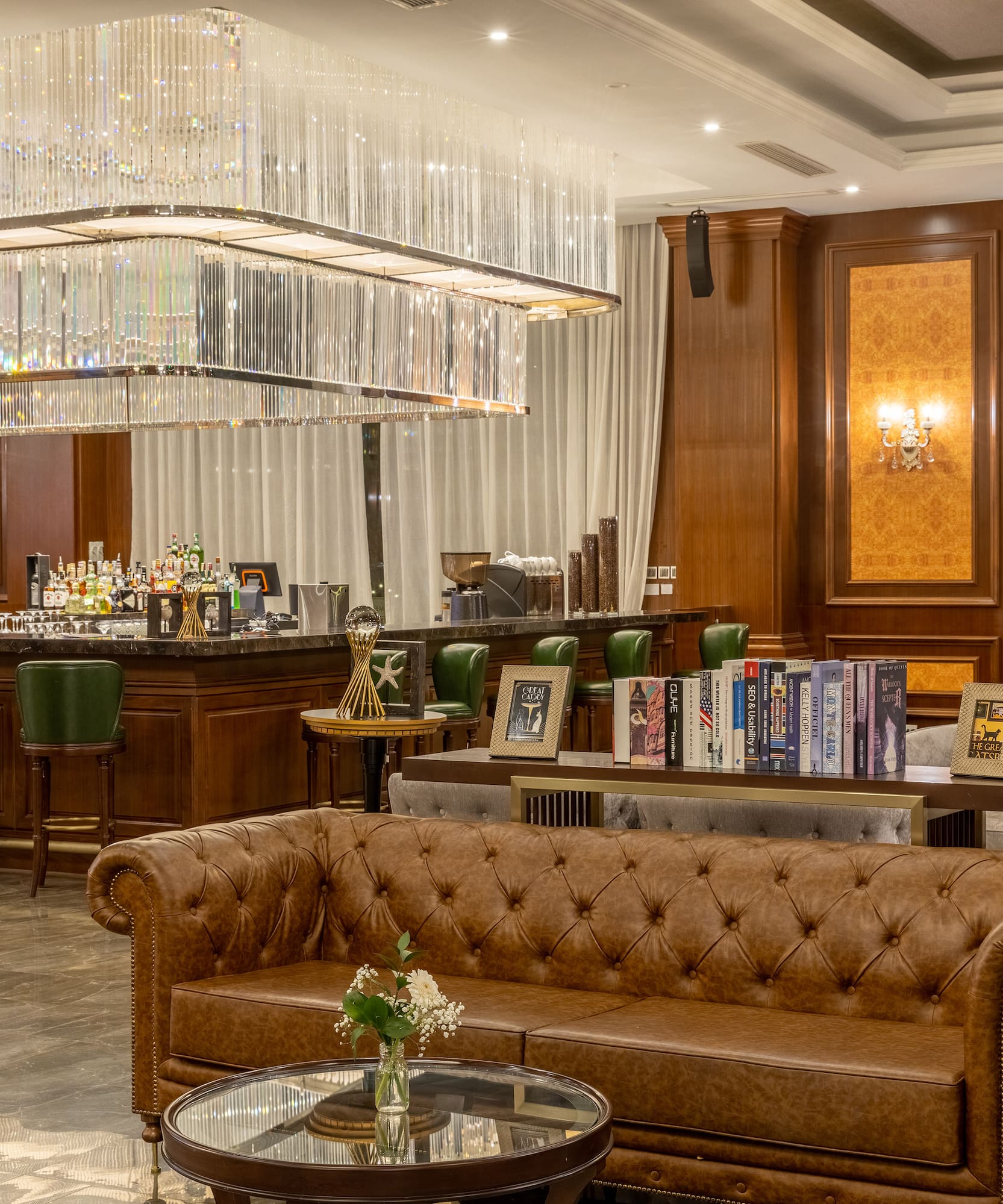 a room with couches and tables and chairs