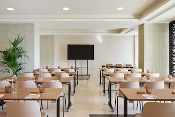 a room with tables and chairs