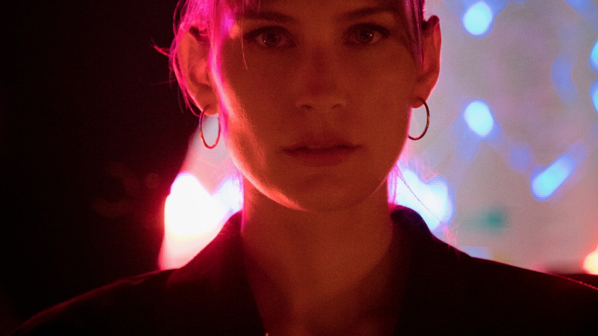 a woman in a dark room