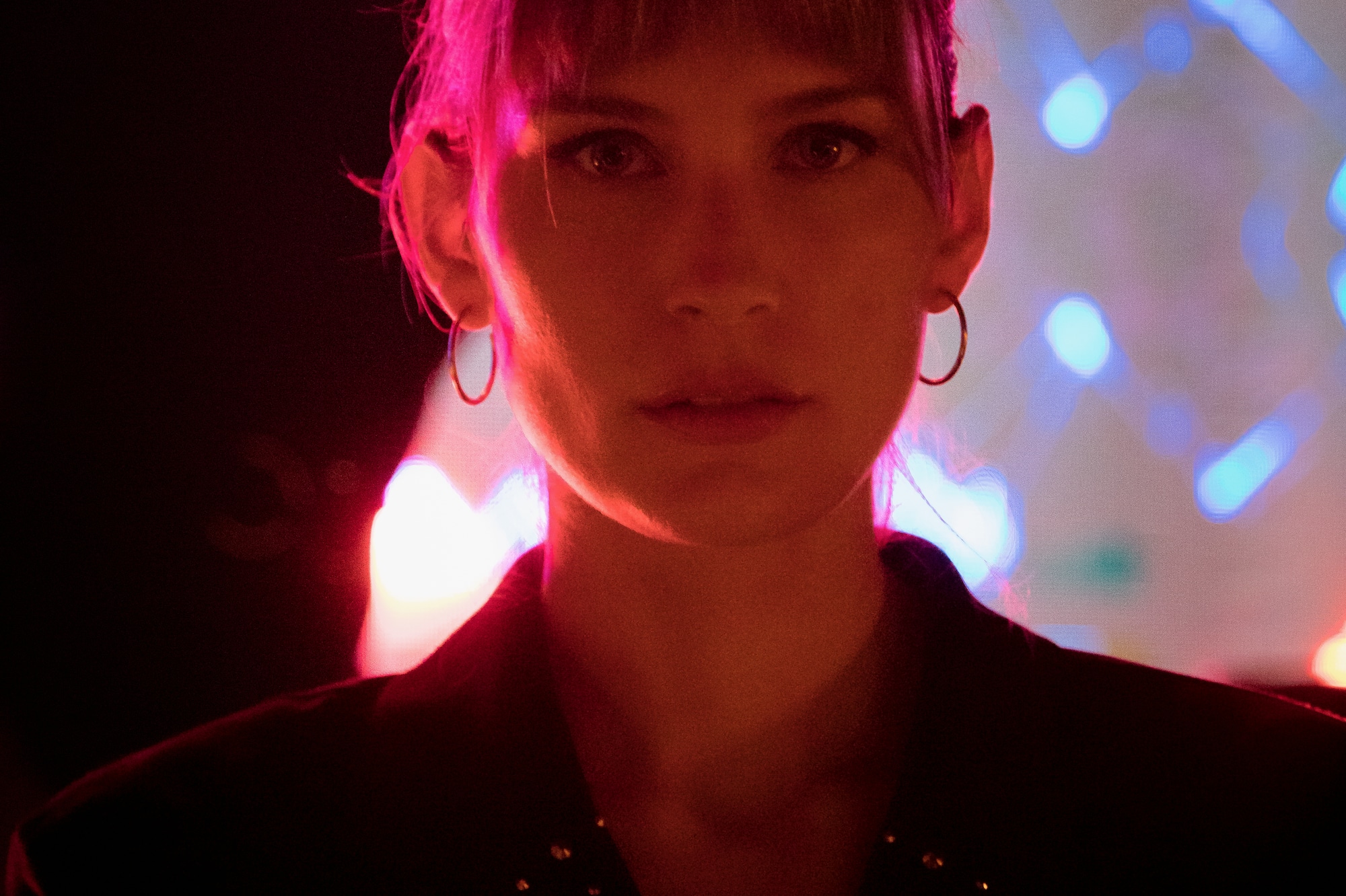 a woman in a dark room