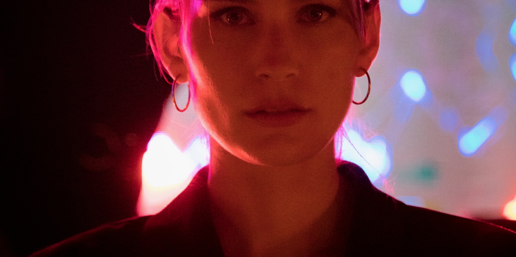 a woman in a dark room