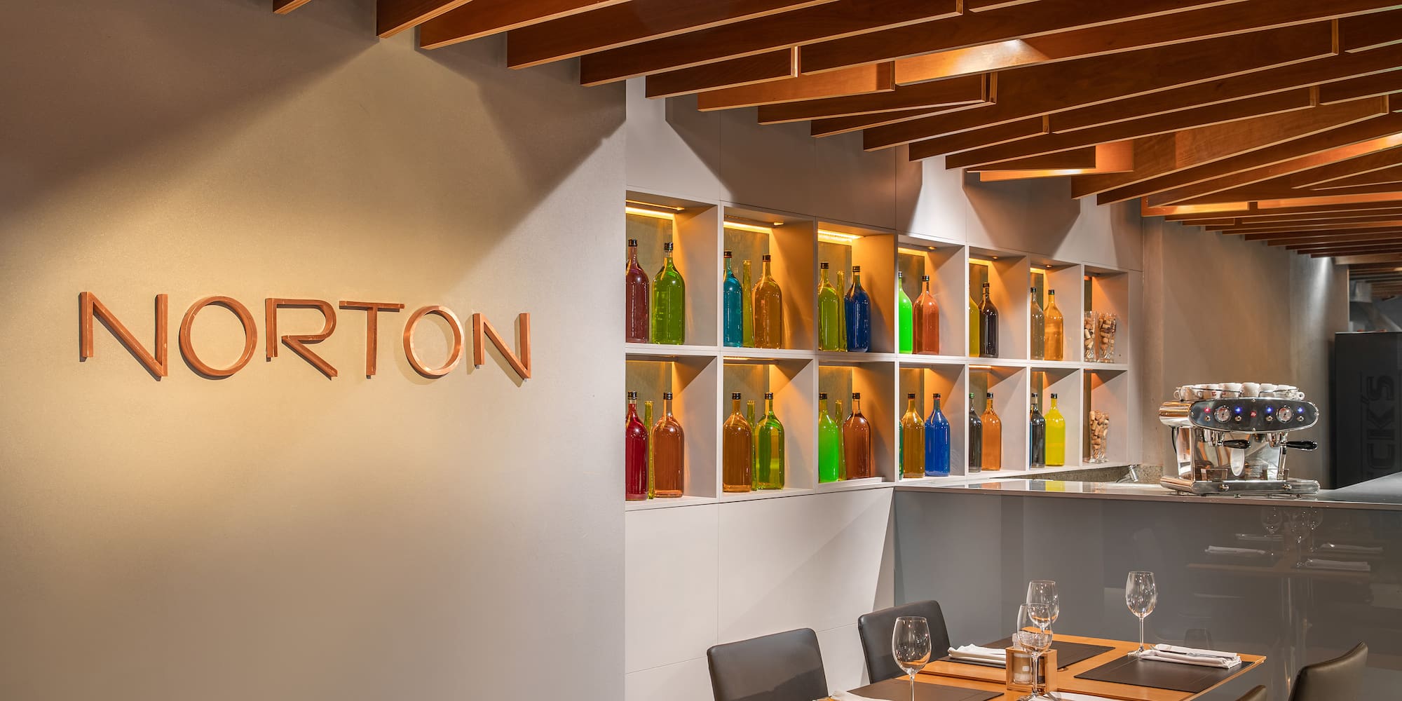 a restaurant with a table and chairs