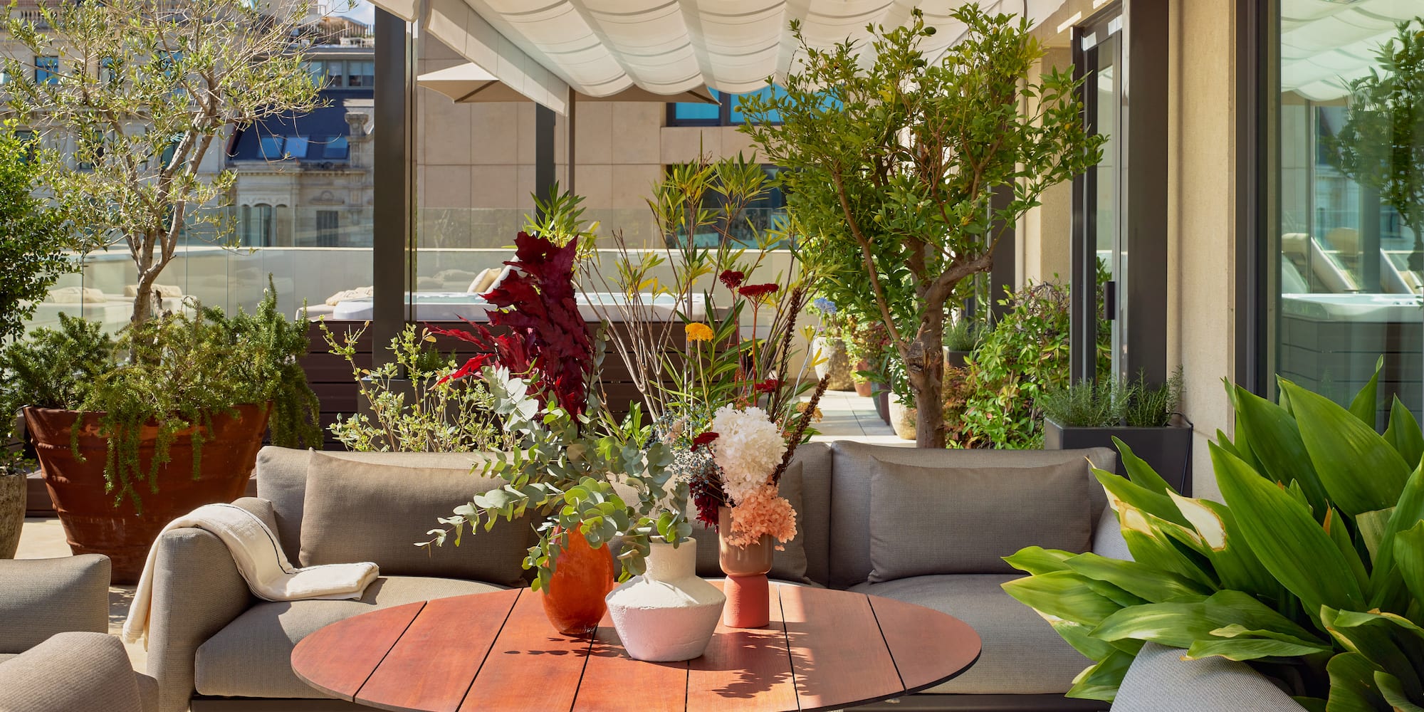 a patio with a table and chairs