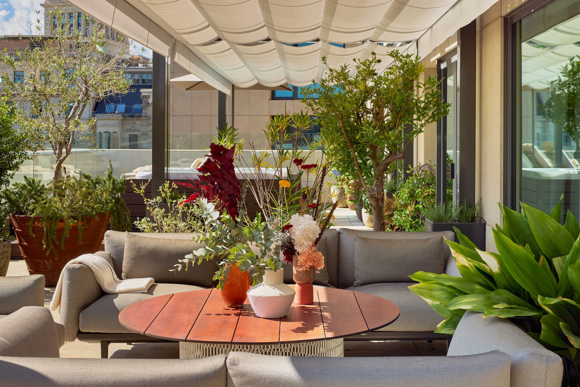 a patio with a table and chairs