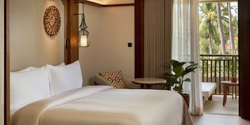 a room with a bed and a window