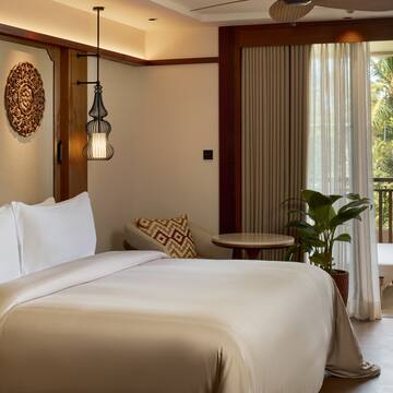 a room with a bed and a window