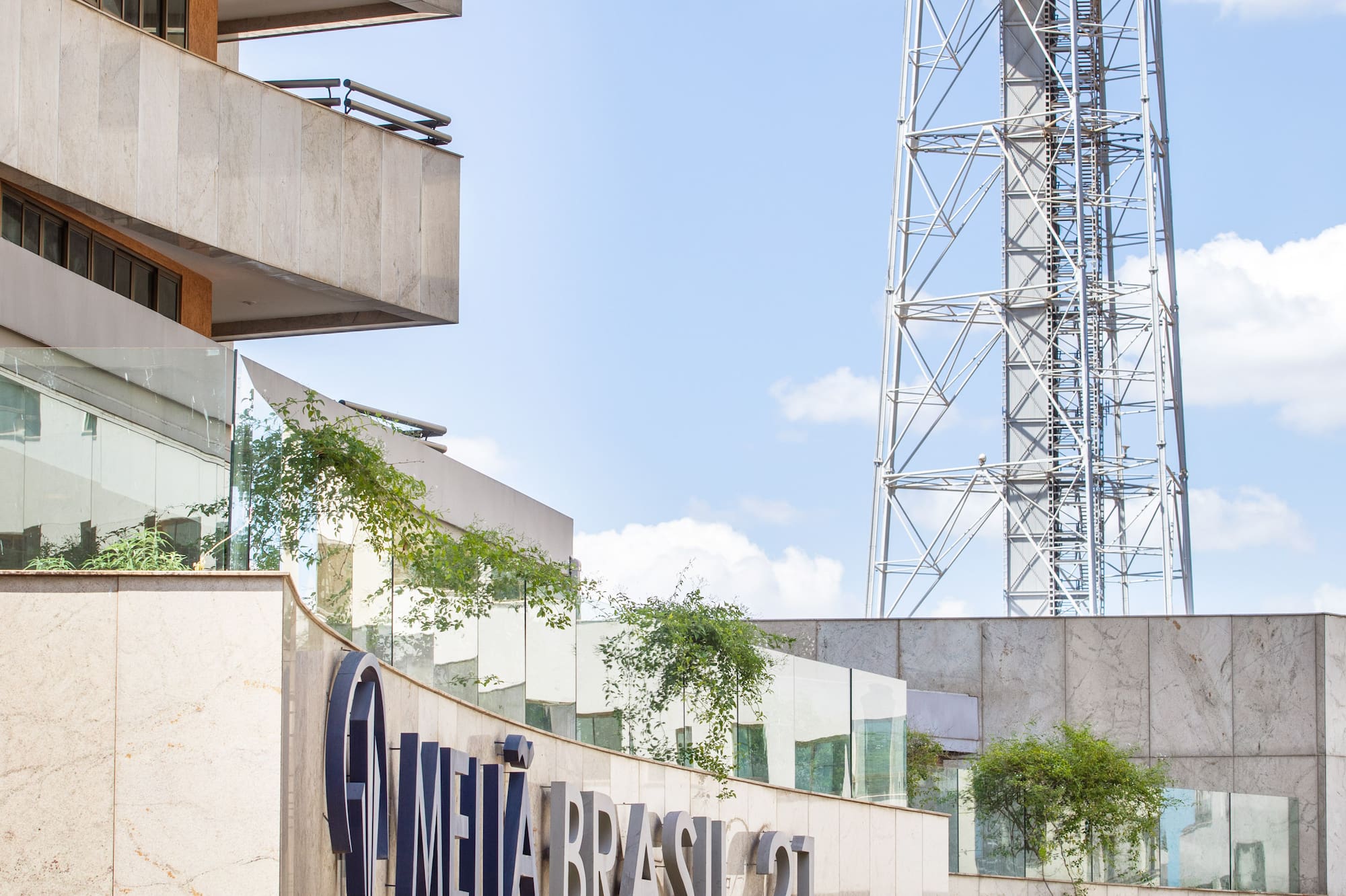 a building with a tower in the background