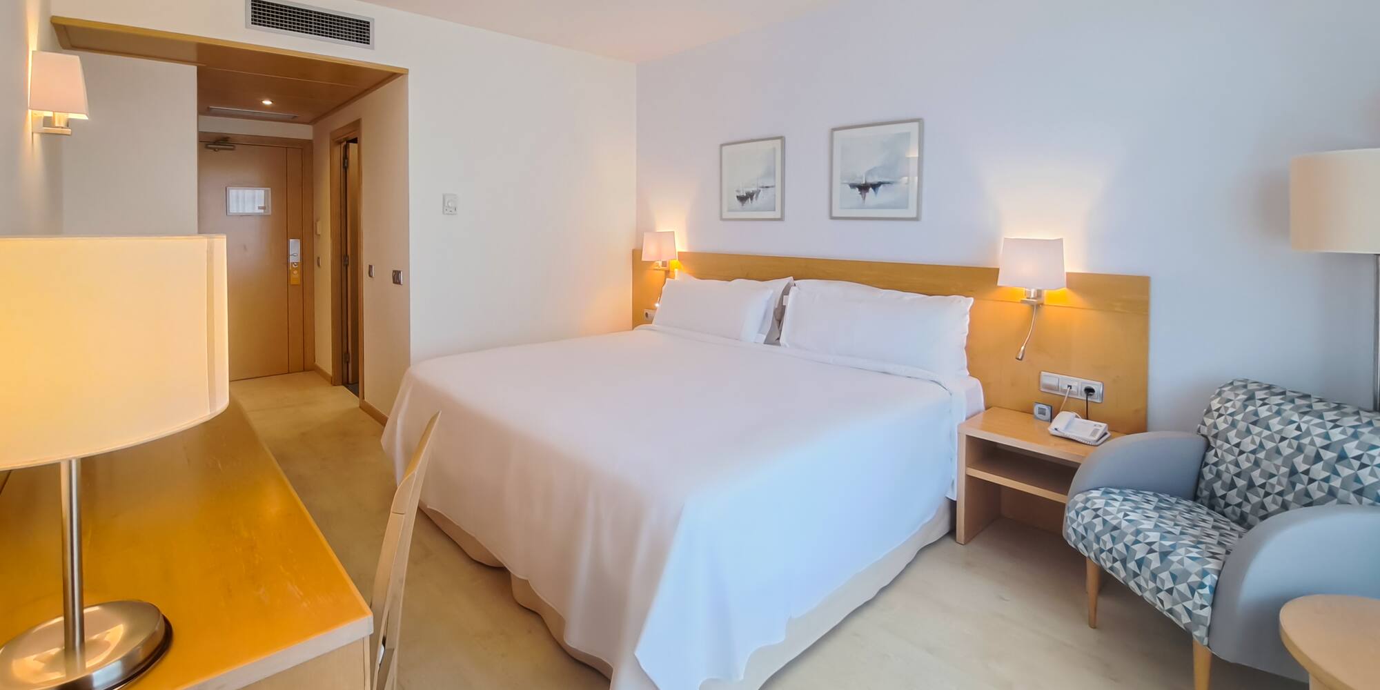 a room with a bed and a chair