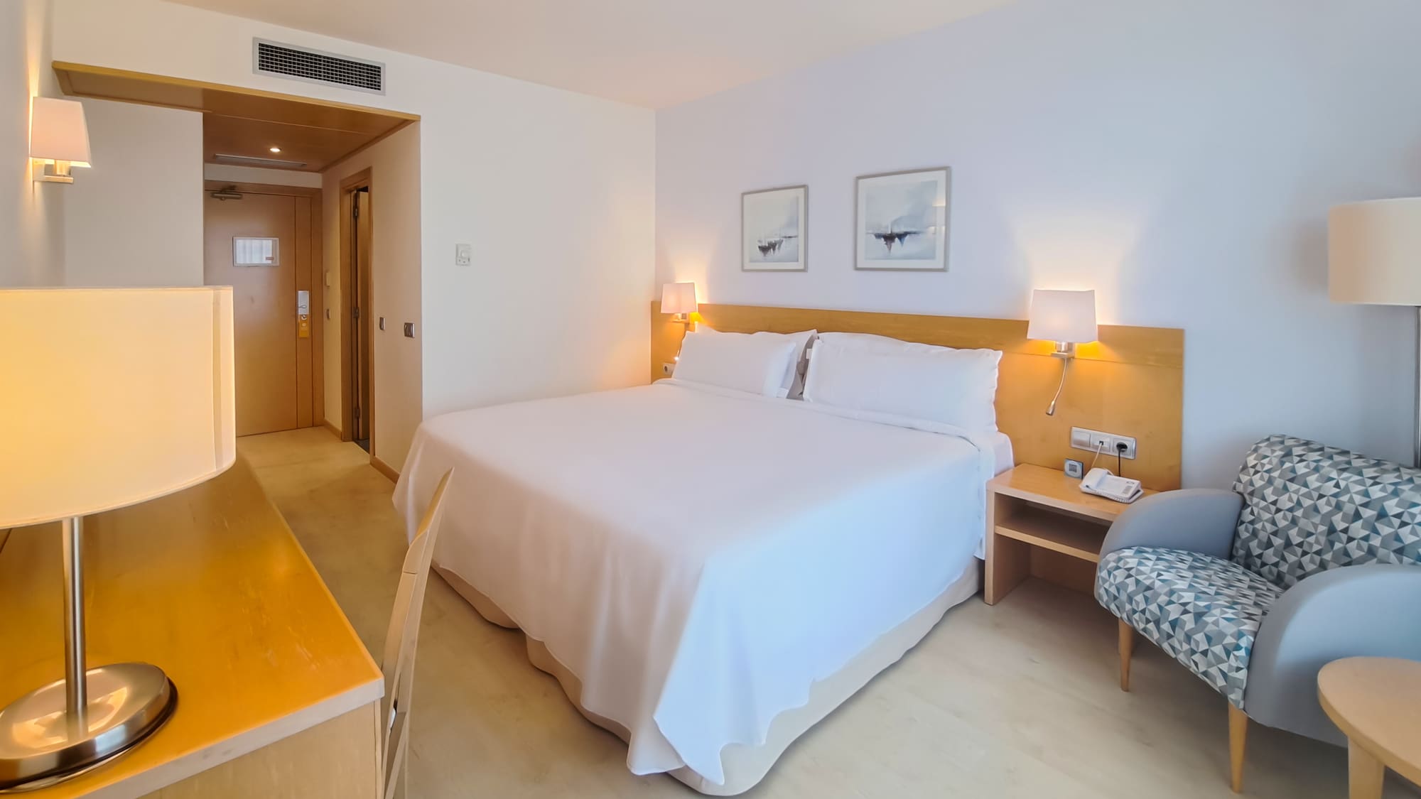 a room with a bed and a chair