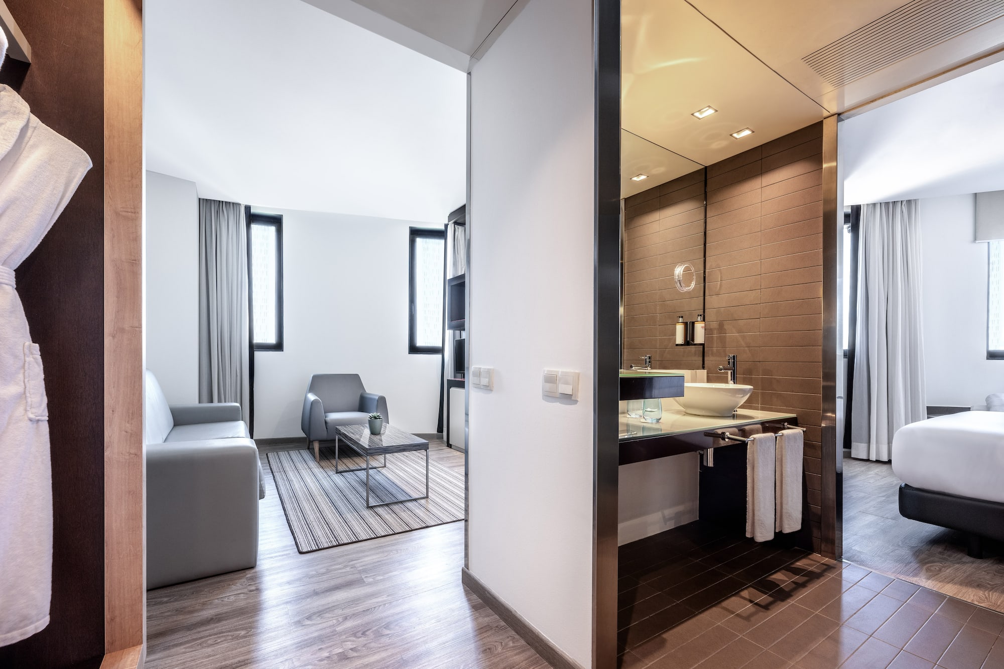 a room with a sink and a couch