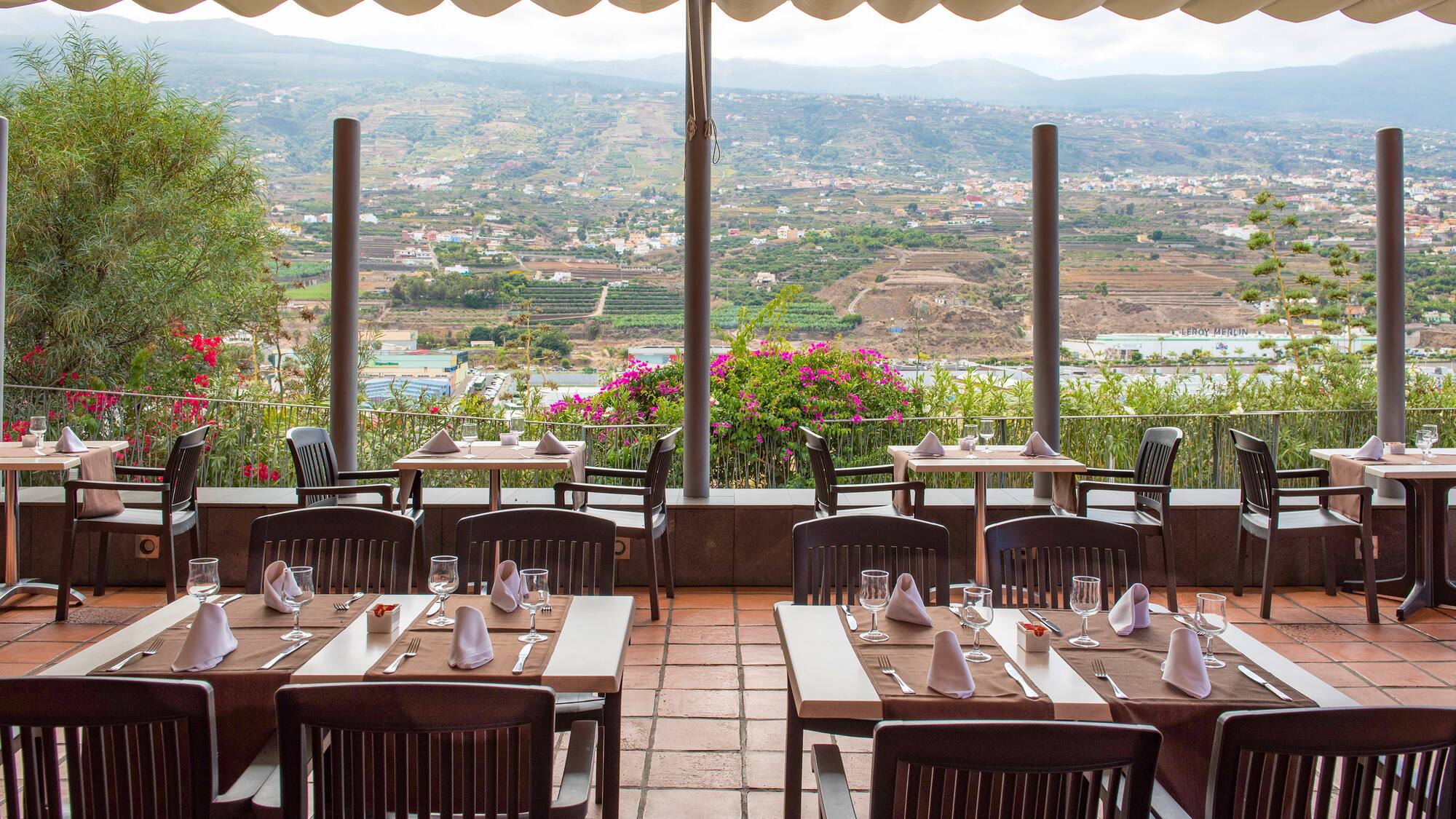 a restaurant with tables and chairs