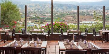 a restaurant with tables and chairs