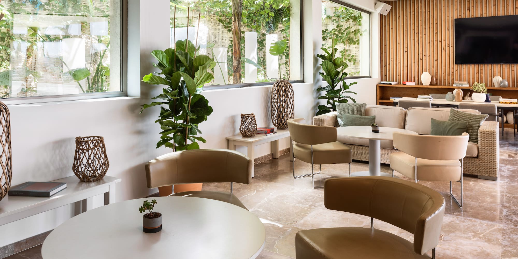 a room with chairs and tables