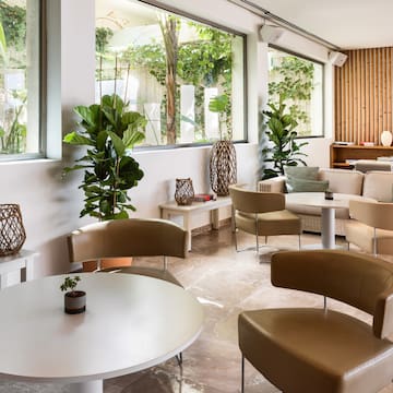 a room with chairs and tables