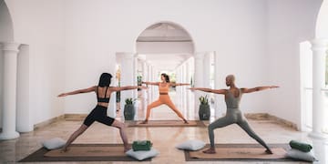 a group of women doing yoga