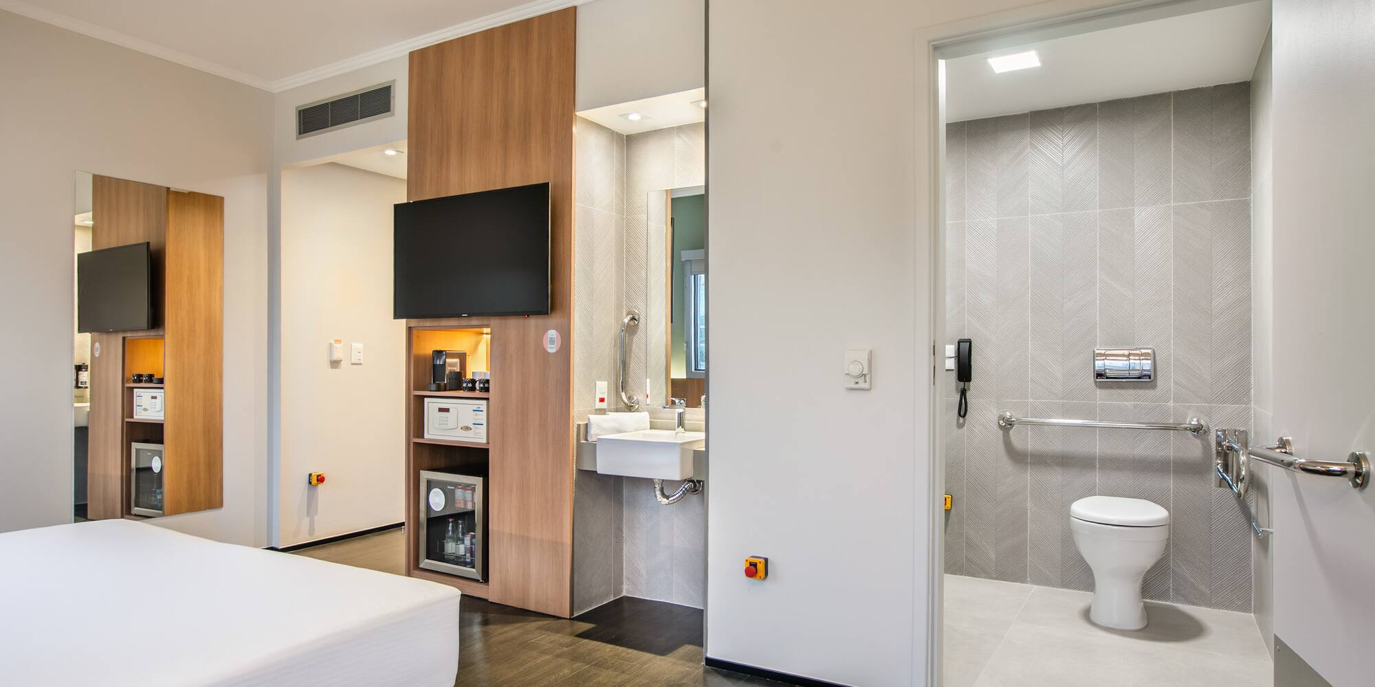 a room with a toilet and sink
