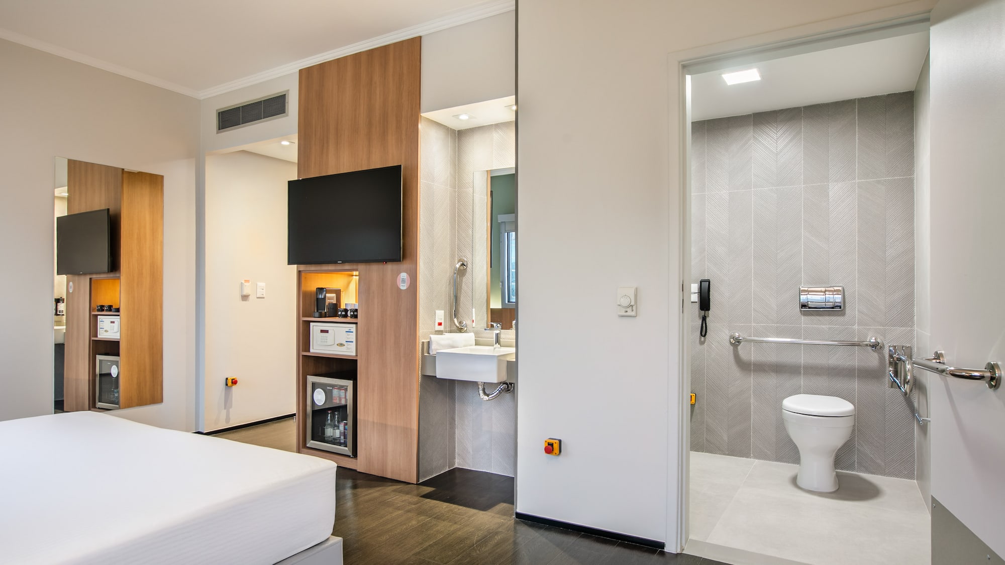 a room with a toilet and sink