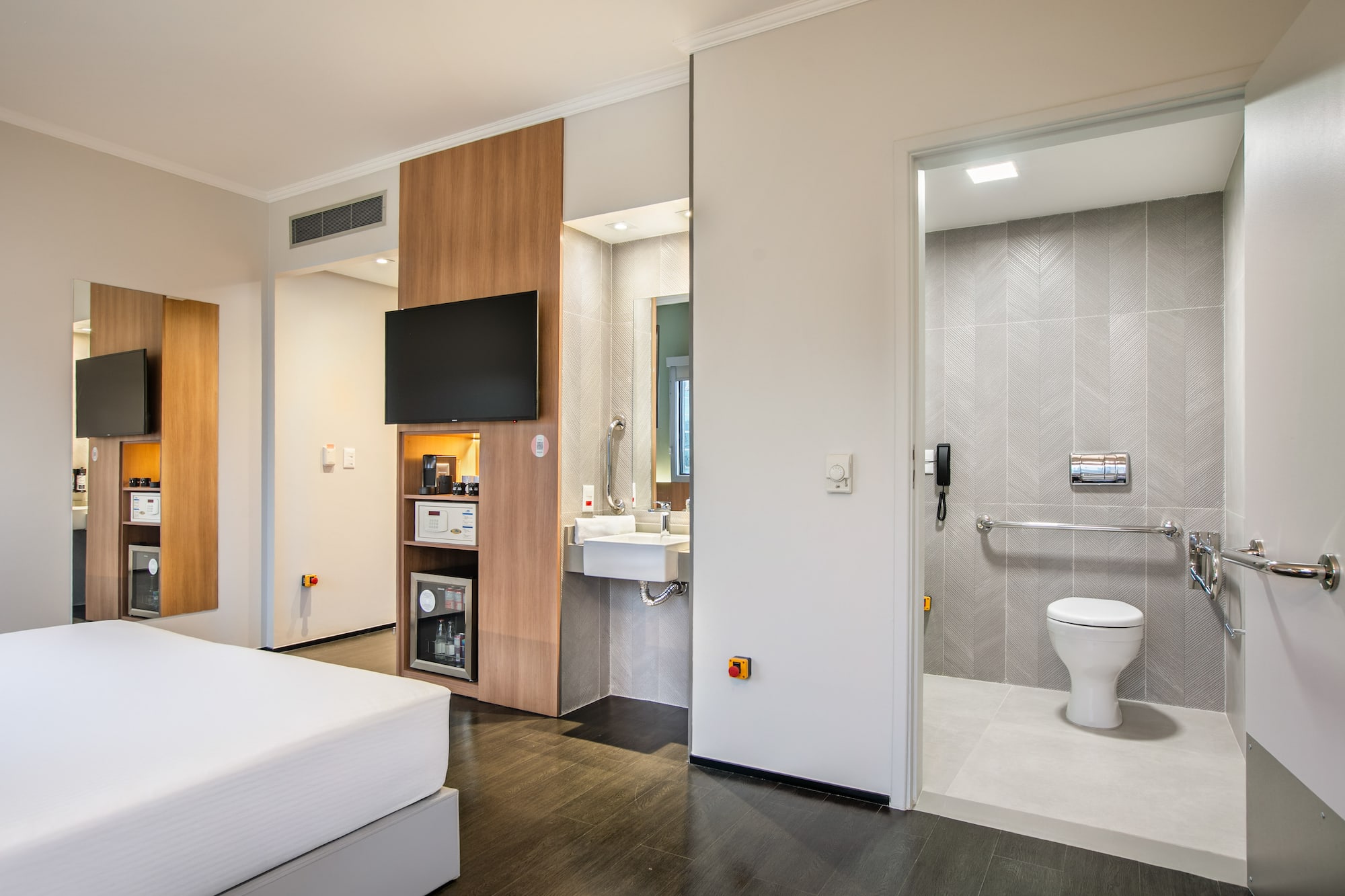 a room with a toilet and sink