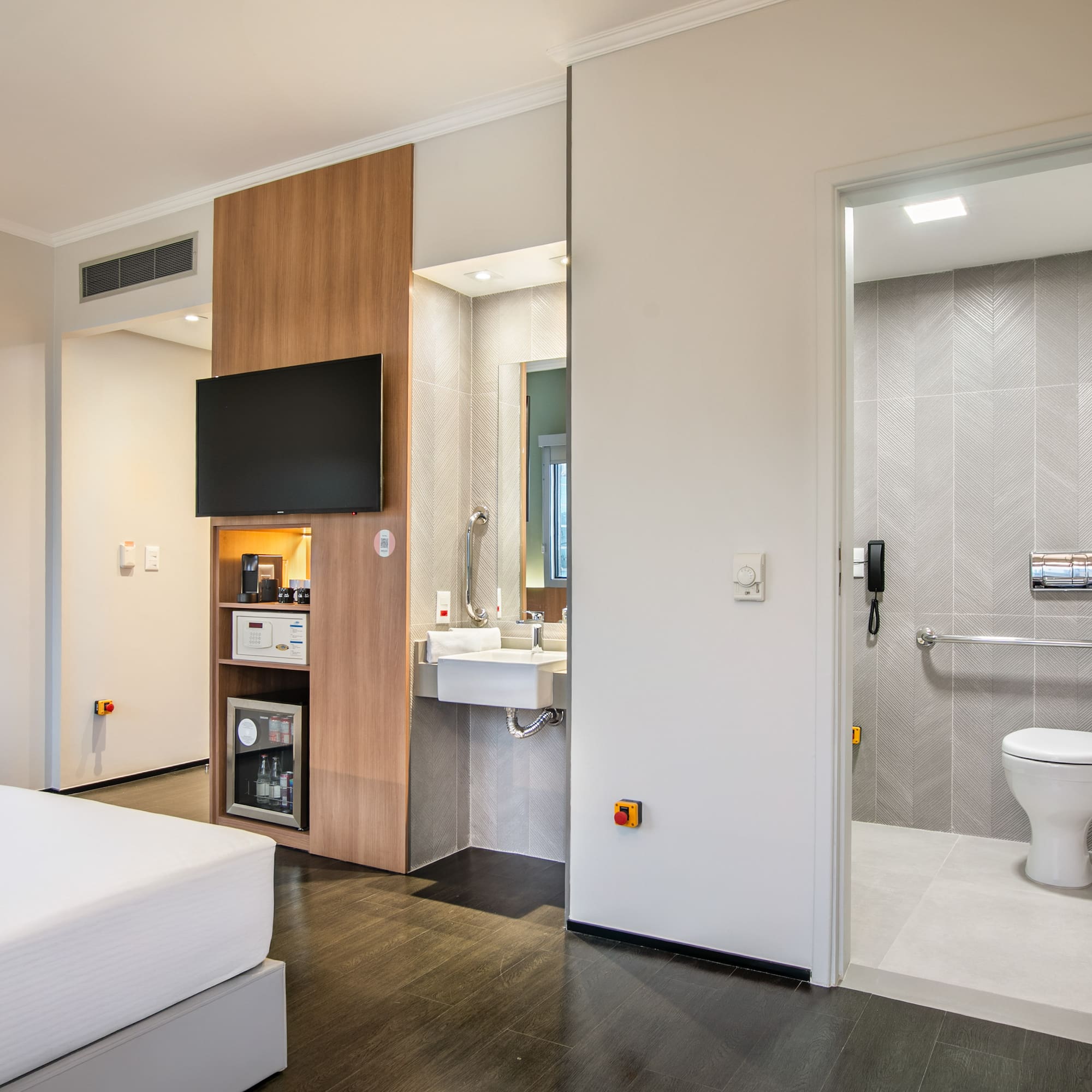 a room with a toilet and sink