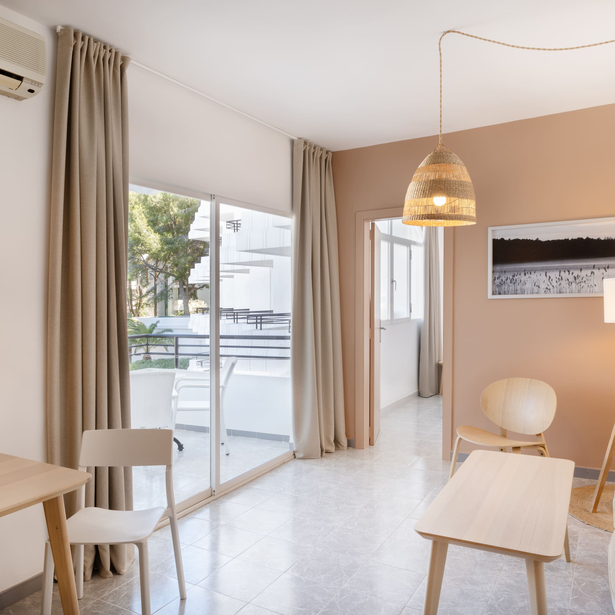 a room with a table and chairs