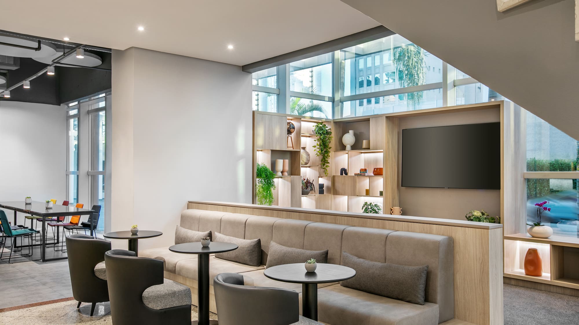 a room with a large wall and a large window