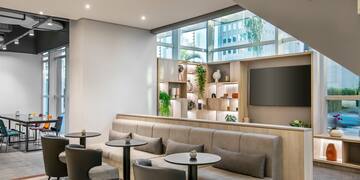 a room with a large wall and a large window