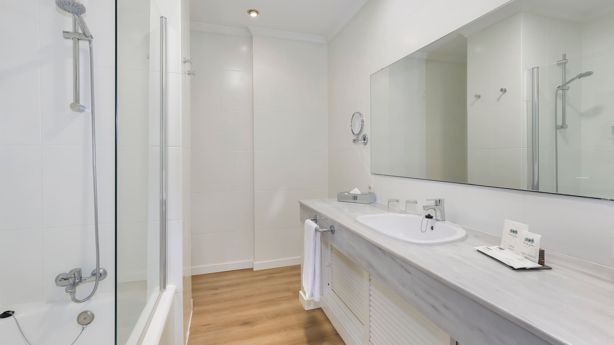 a bathroom with a mirror and sink